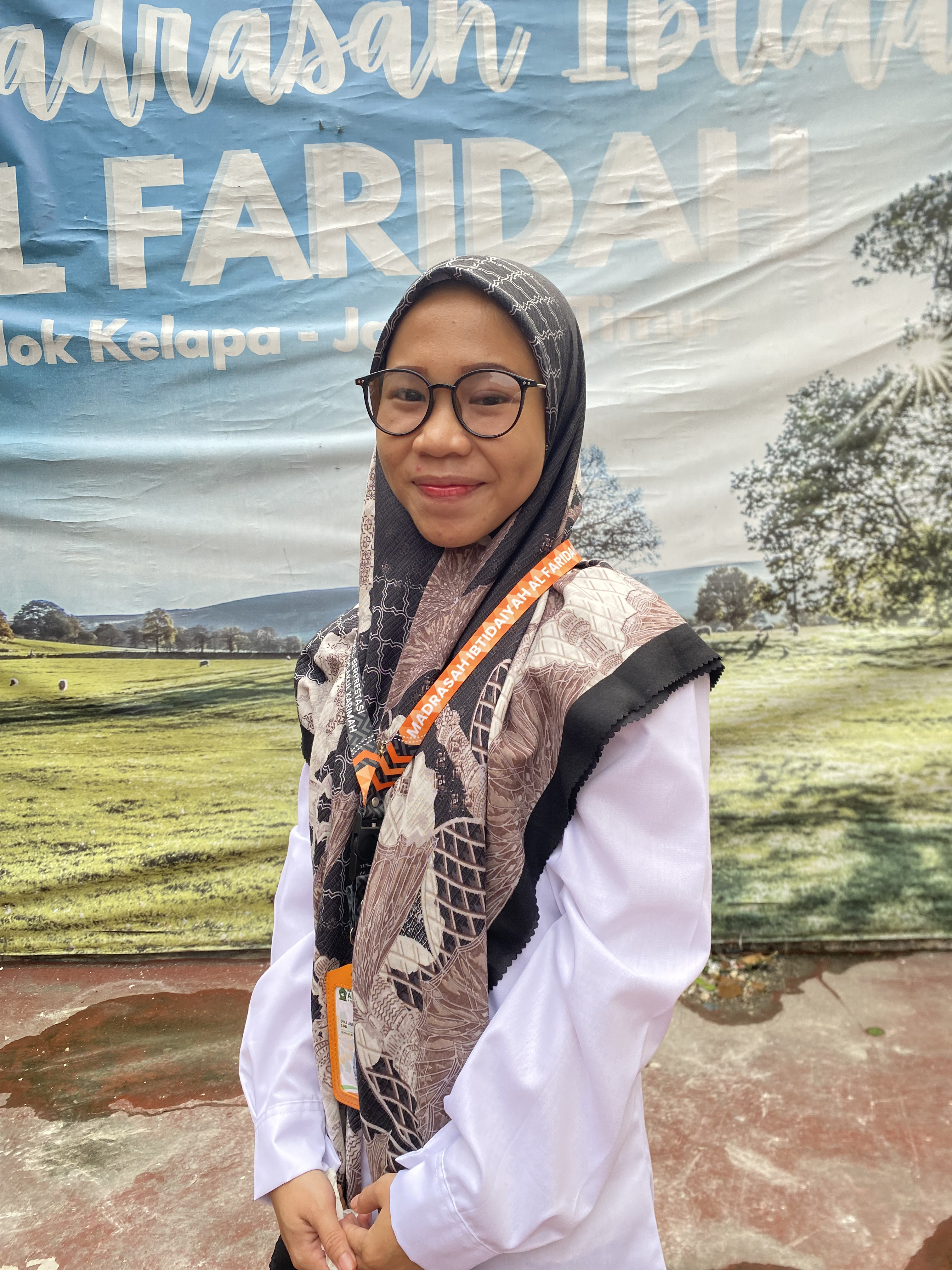 Ibu DINA AULIA, S.PD